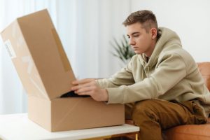 man unboxing