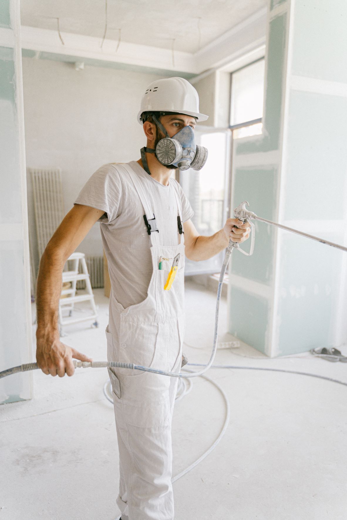 home maintenance staff in white