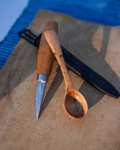 tiny knife along with wooden spoon and sheath