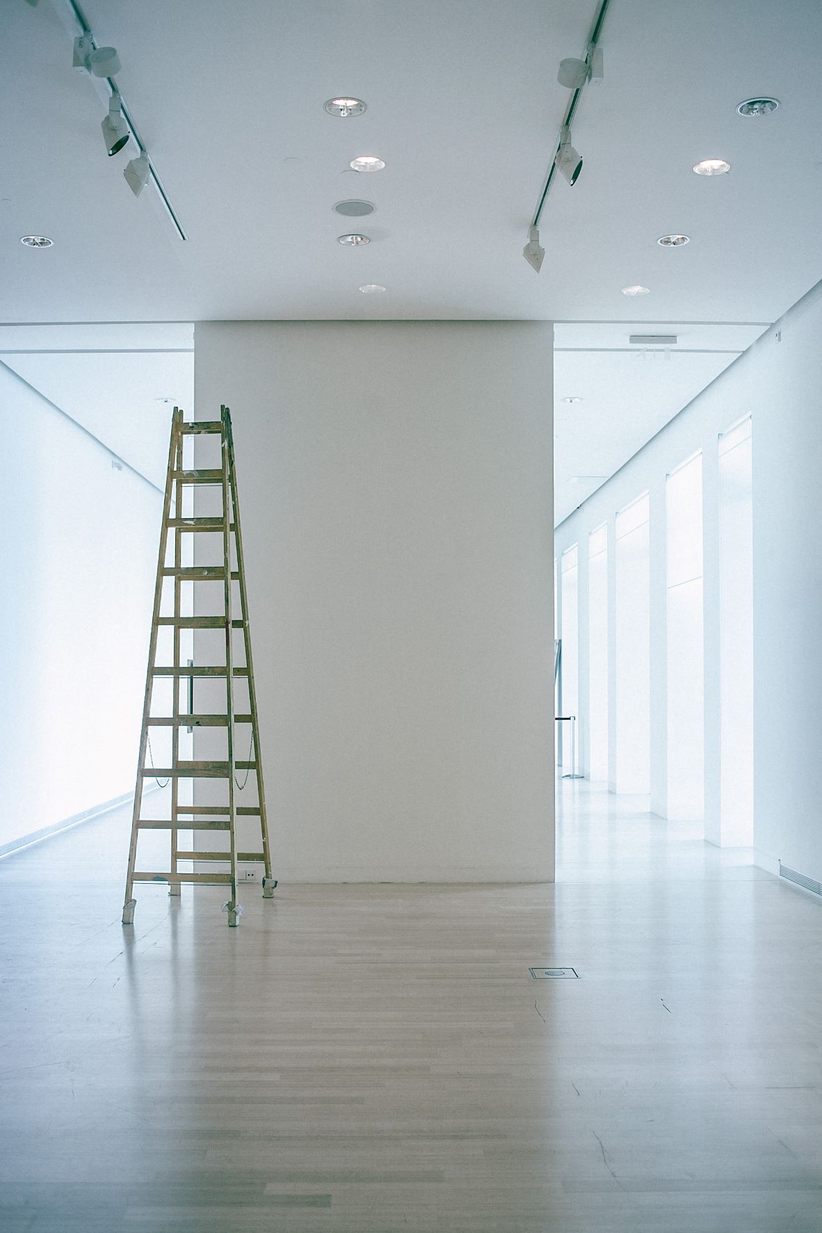 white wall with foldable stairs