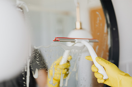 hand cleaning window