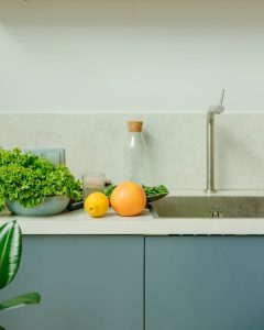 A semi-close up of a kitchen countertop with accessories.