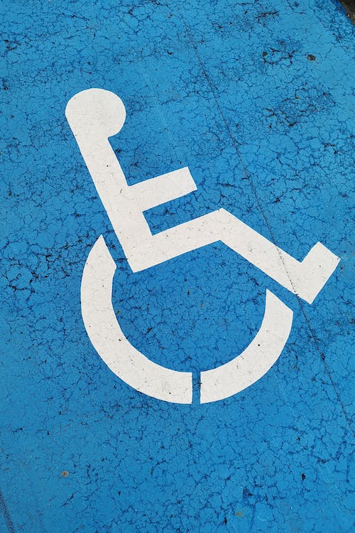 A photo of a PWD sign on the floor.