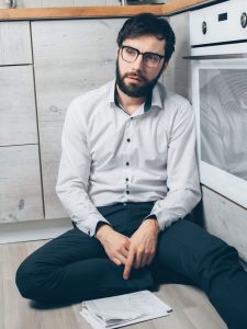 man sitting on the floor