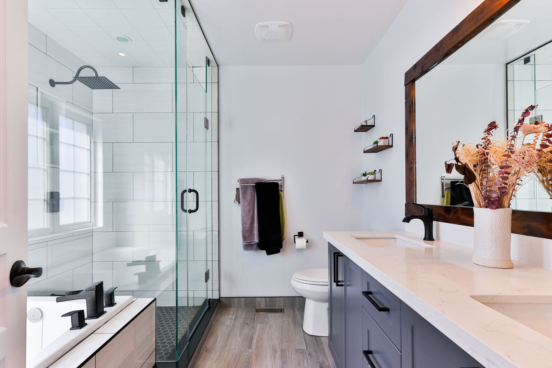 stylish modern bathroom with glass door