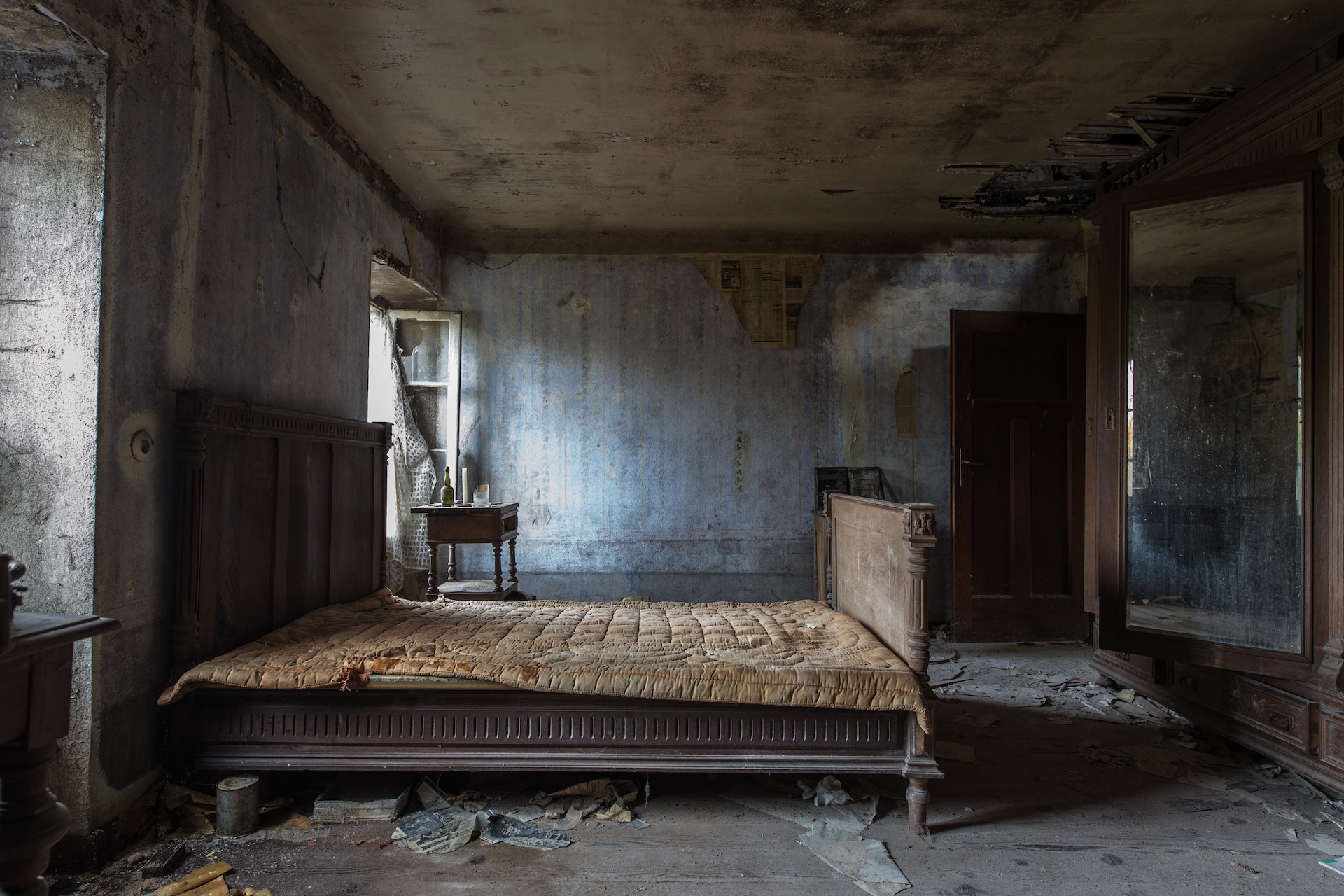 A dirty, abandoned room with a filthy bed Off Cleaning Too Long