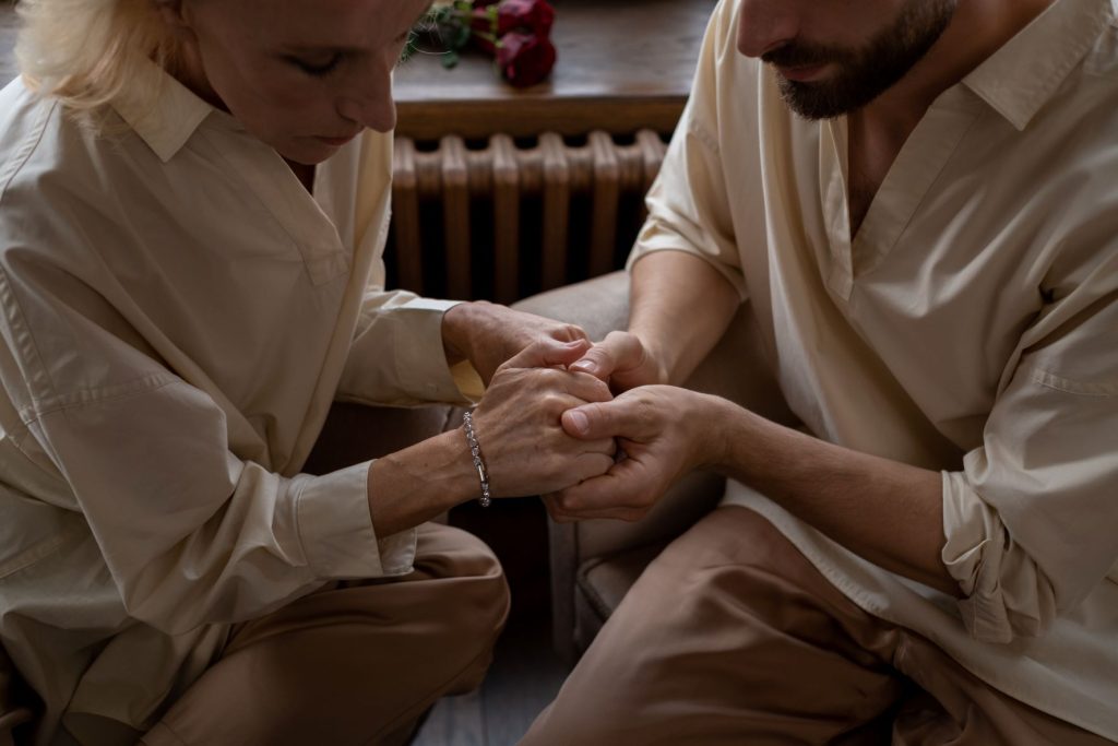 a photo of people holding hands