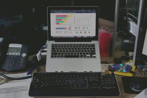 laptop on desk web traffic optimization trends for 2024